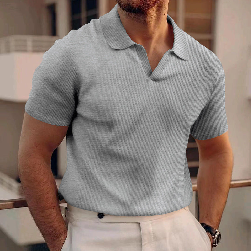 Stylish v-neck polo shirt for men in light gray color, showcasing a slim fit design and comfortable material.